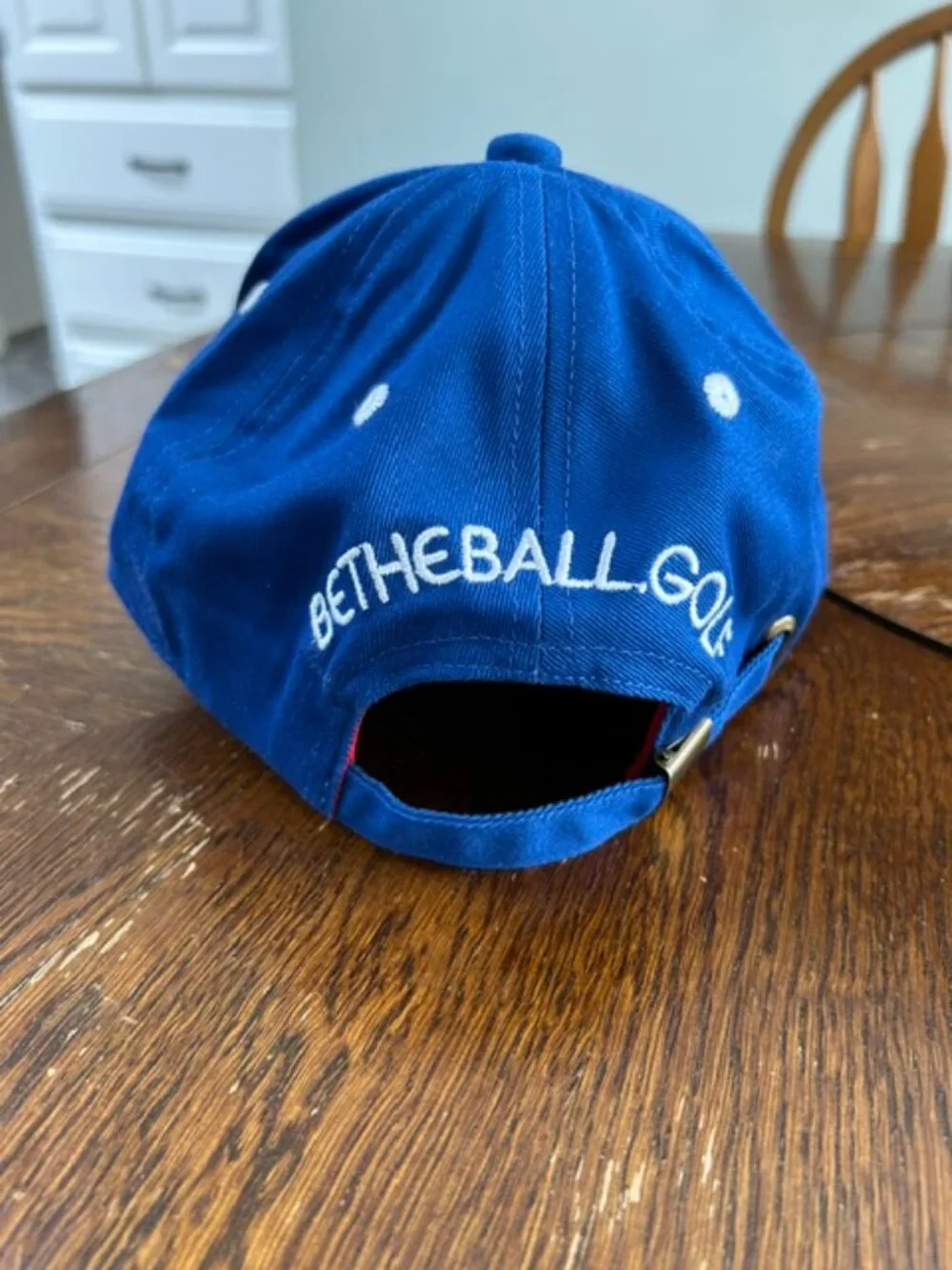 BE THE BALL Golf Cap with adjustable strap - $19
